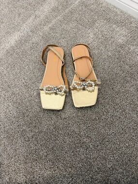 Women’s gold pearl bow sandals